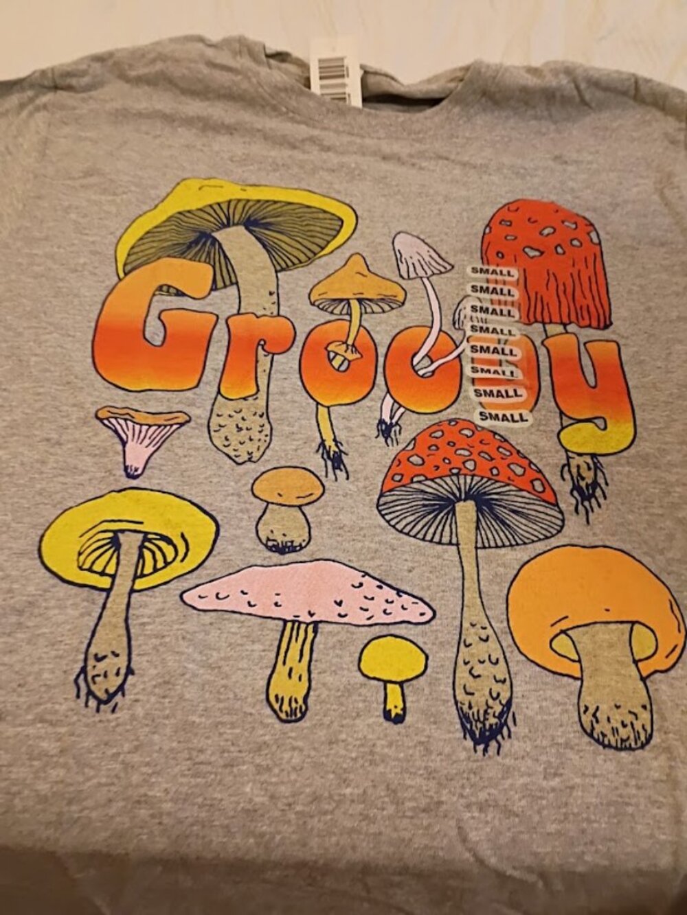 Fruit of the loom groovy mushroom S Length 27" pit to pit 17"